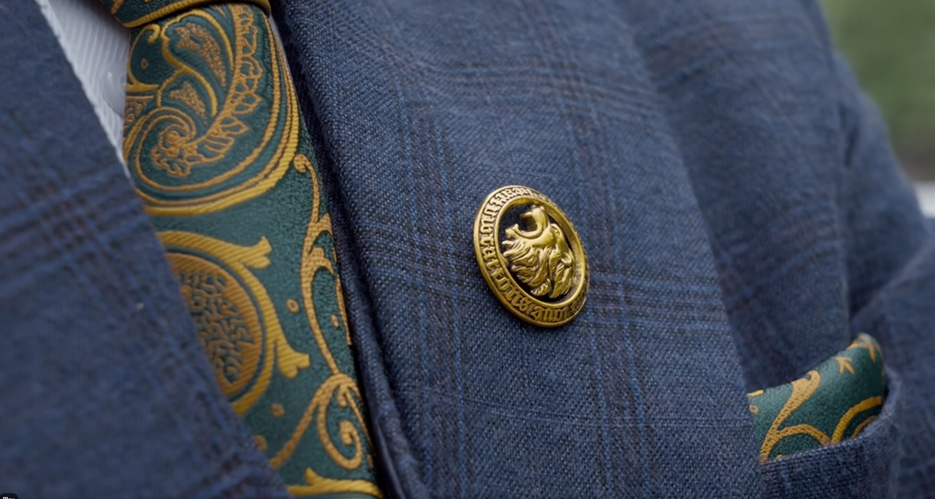 The Dudani Law lion pin worn by Jitesh Dudani