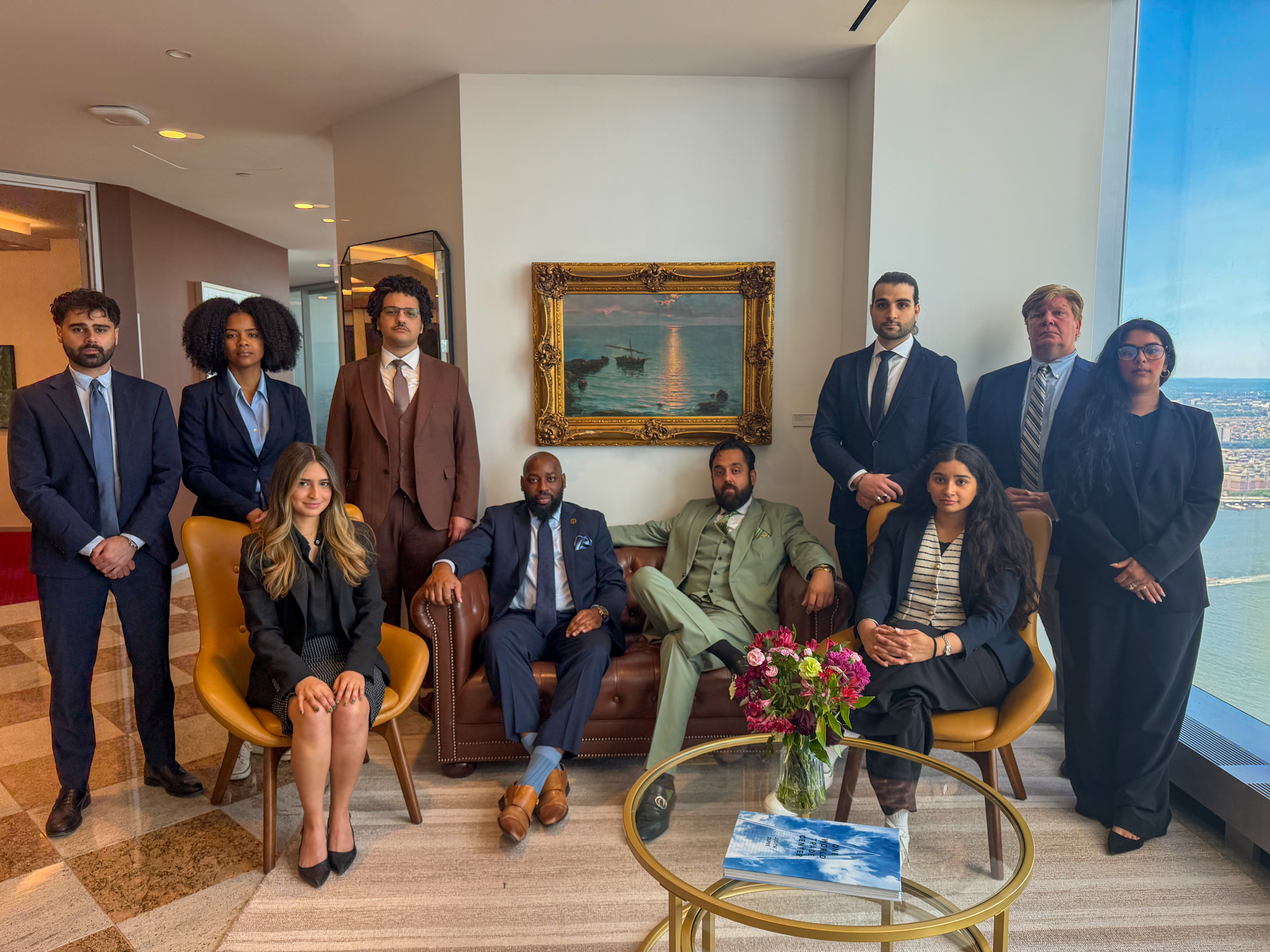 The Dudani Law team at the firm's World Trade Center office